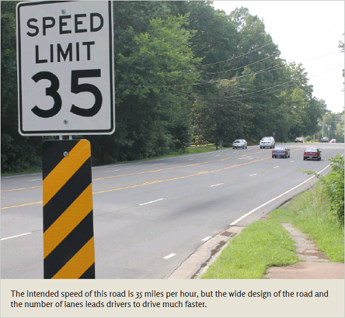 Photo of a road with a speed limit 35 sign - The intended speed of this road is 35 miles per hour, but the wide design of the road and the number of lanes leads drivers to drive much faster.