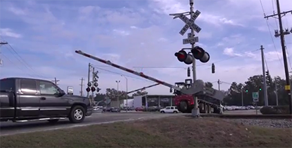 a truck at a railroad crossing
